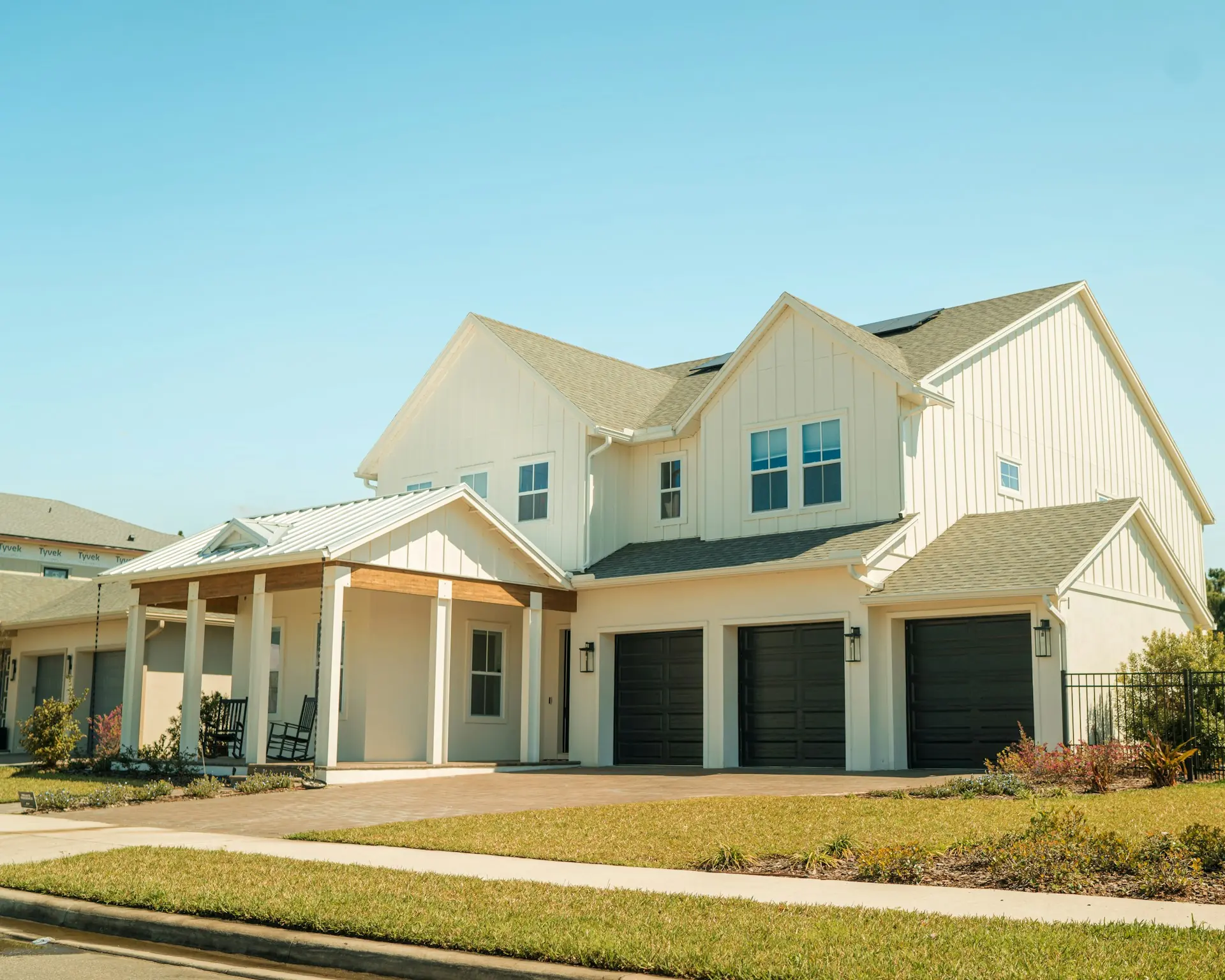 Finished two-story home with a shingle roof